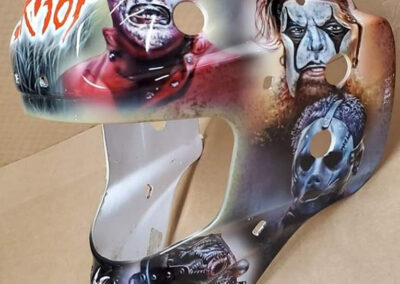 Slipknot Goalie Mask - left side showcasing some of the heavy metal bands member masks